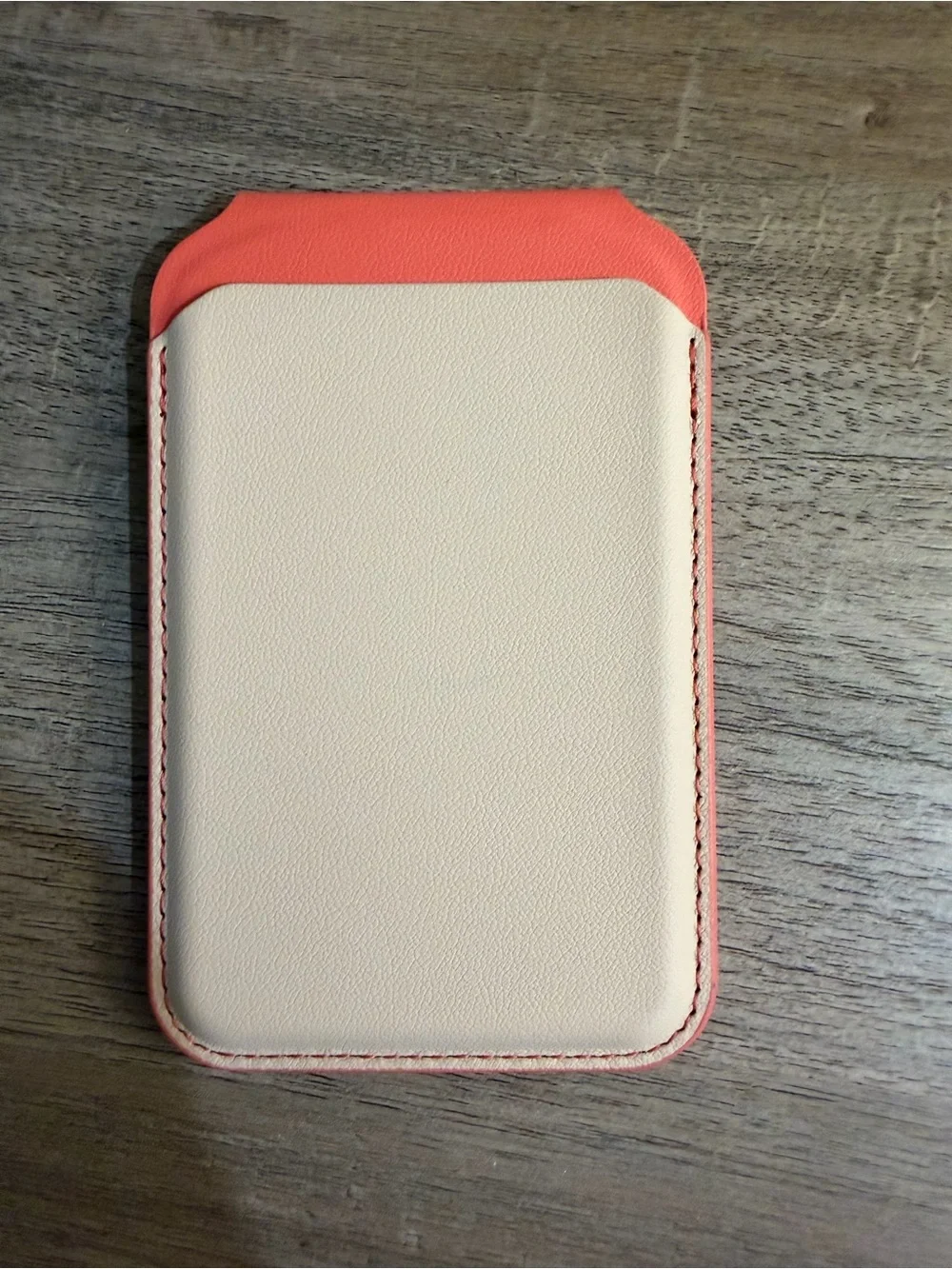 Anker Coral Orange Power Bank, Satechi Magnetic Wallet Stand, and Pop Socket